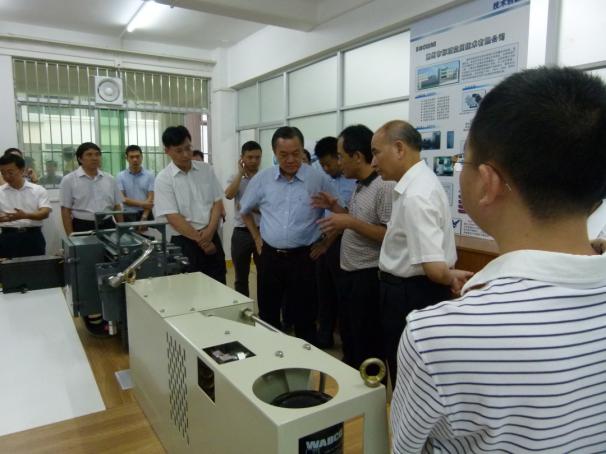 2015年9月市委书记陈奕威到惠州学院参展中了解乐橙国际电游首选公司产品及相关项目